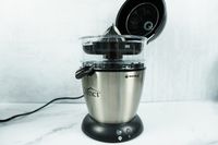 a Vinci electric citrus juicer with its hinged lid open