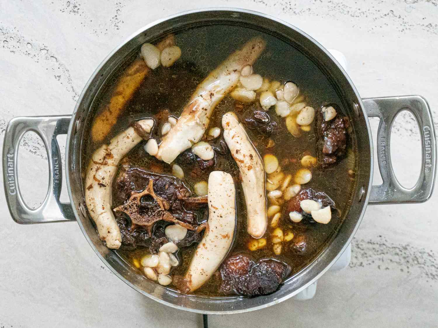 Butter beans added to pot