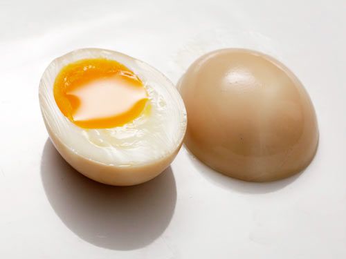 A perfect soft-boiled and marinated egg (ajisuke tamago) cut in half for ramen.