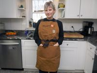 a person wearing the carhartt apron
