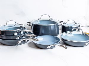 The GreenPan Valencia Pro Ceramic Nonstick 11-Piece Cookware Set on a white surface