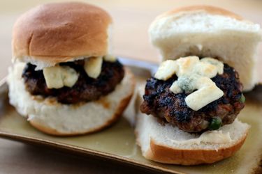 Two shepherd's pie slides, served on a small rectangular platter.