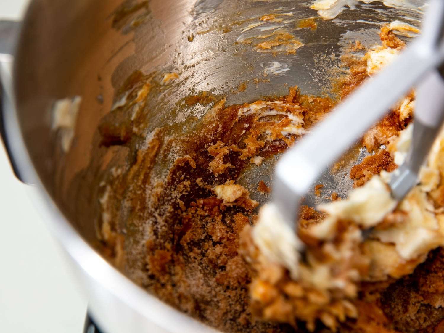 The butter-sugar mixture for lactation cookies before creaming: lumpy, dark, and dense, with low volume.