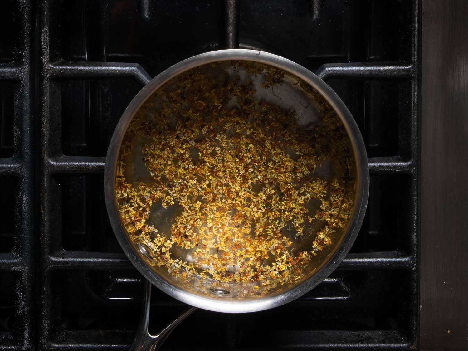 Rock sugar, dried osmanthus and chrysanthemum steeping in water