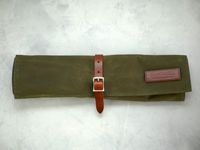 Hardmill knife roll on a gray surface