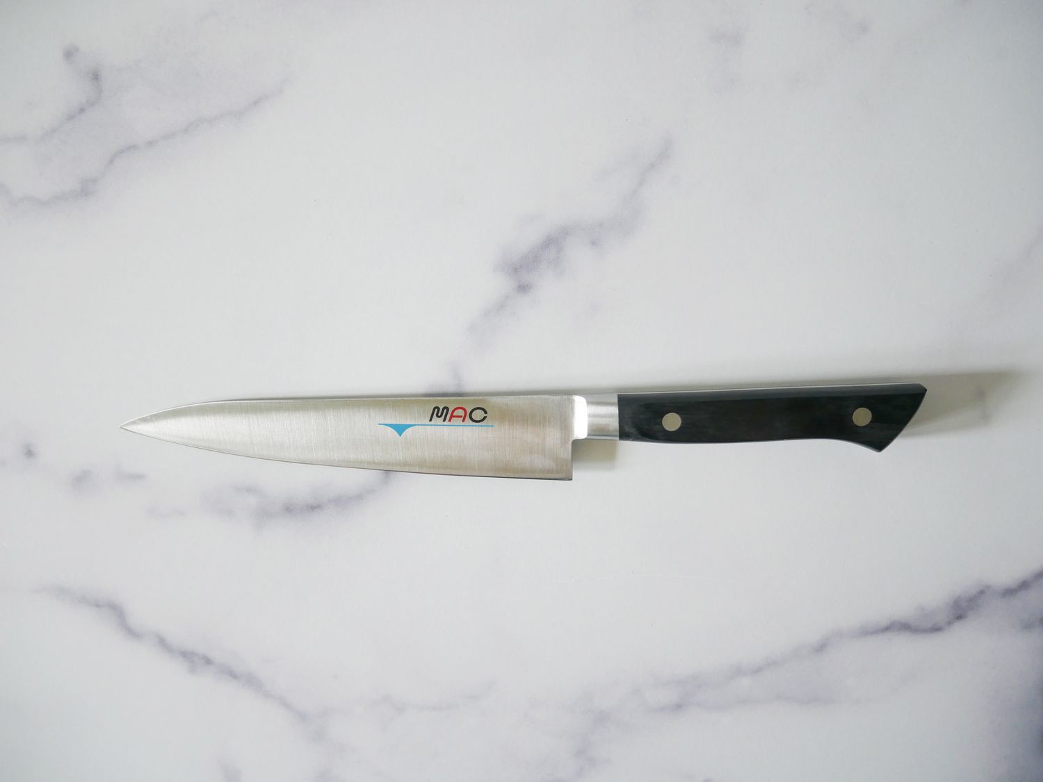 mac petty knife on marble countertop