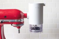 Kitchen mixer with attached food grinder