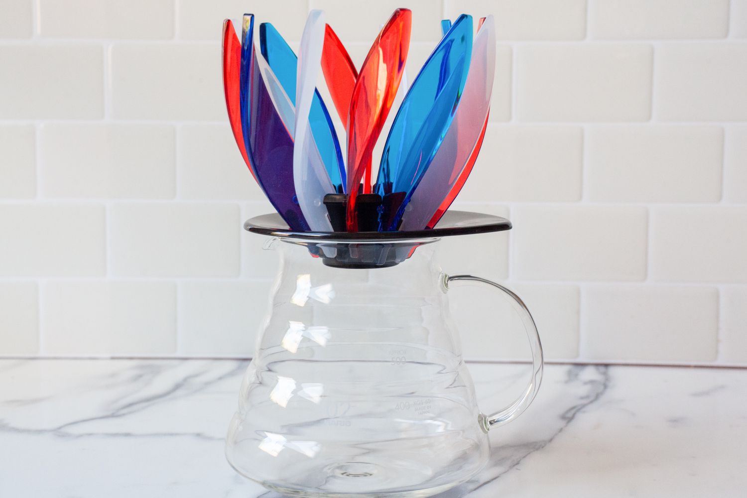 The Hario Suiren on top of a glass carafe.