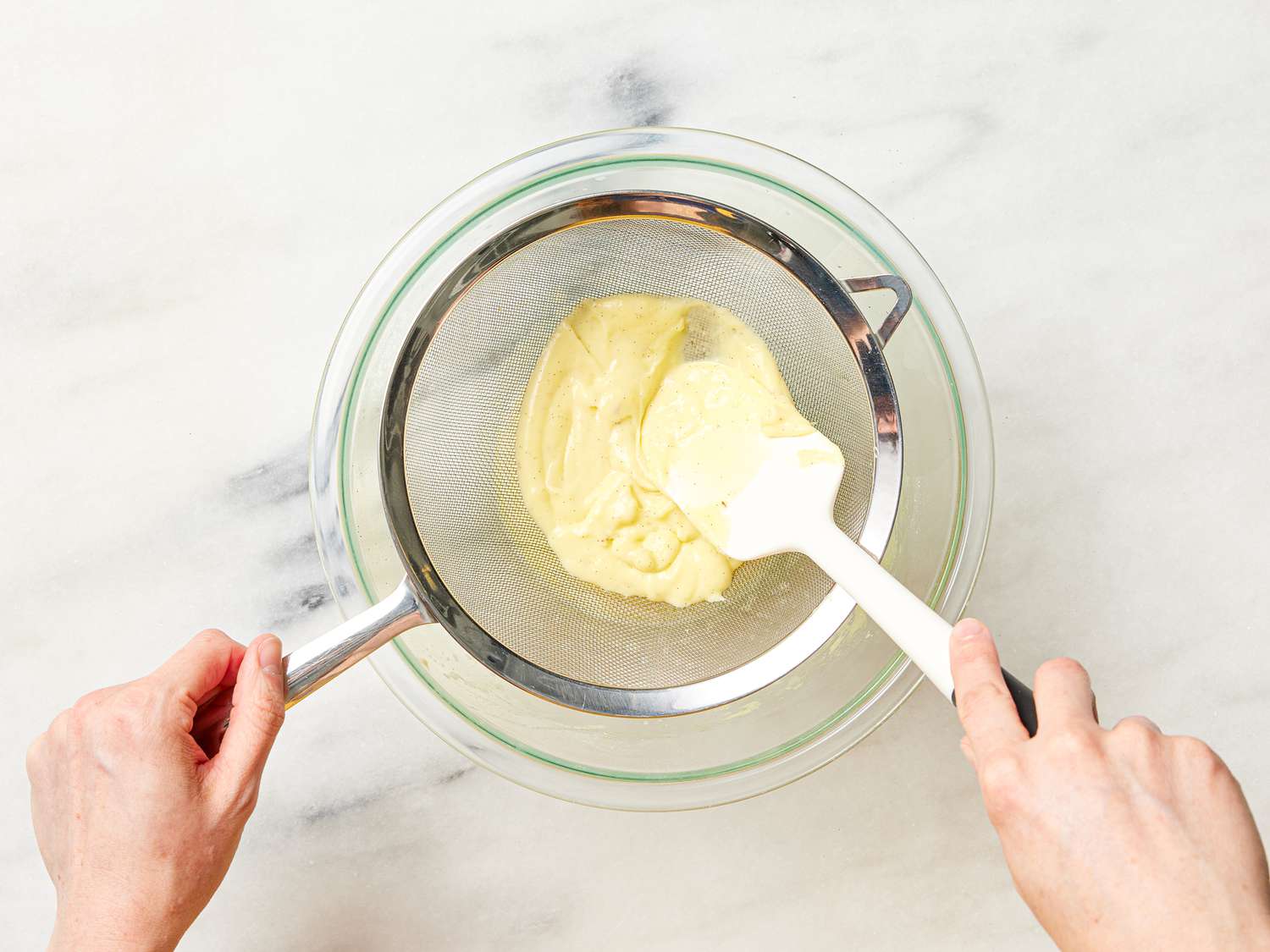 Pushing mixture through fine mesh sleeve