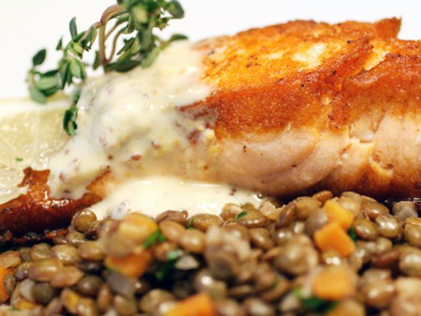 Crispy salmon with lentils du Puy and two-mustard creme fraiche.
