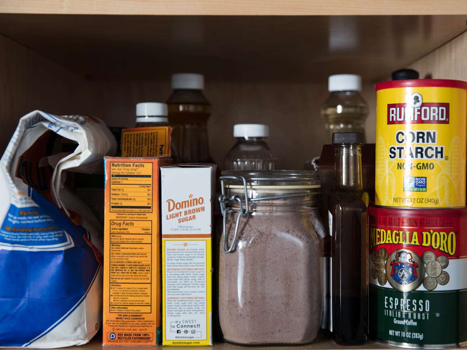 Ingredients for homemade brownie mix on the pantry shelf