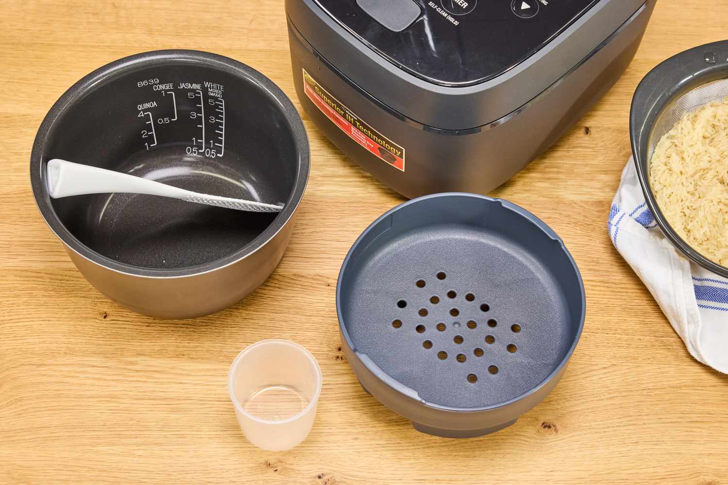 The attachments for the Zojirushi NW-QAC10 Induction Heating Rice Cooker & Warmer