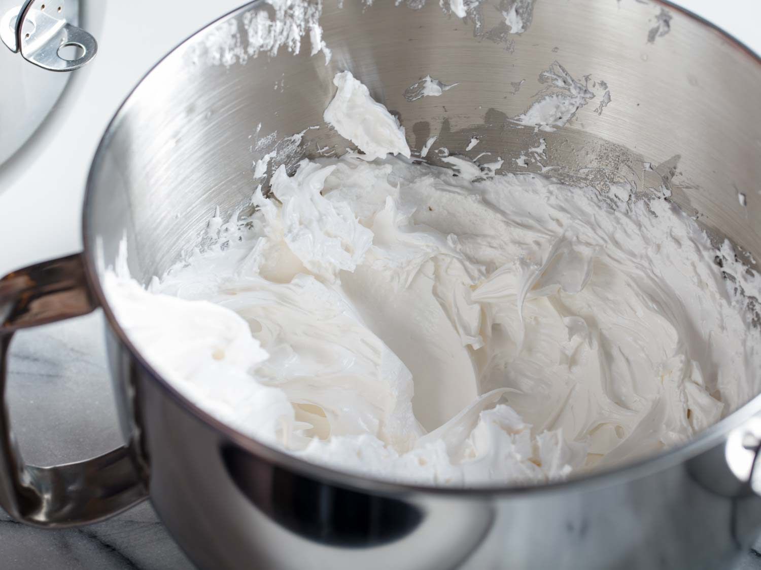 A bowl of Swiss meringue for making homemade Klondike Bars.