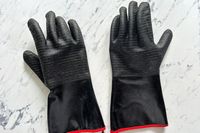 The Grill Armor Gloves BBQ Waterproof Gloves on a kitchen countertop