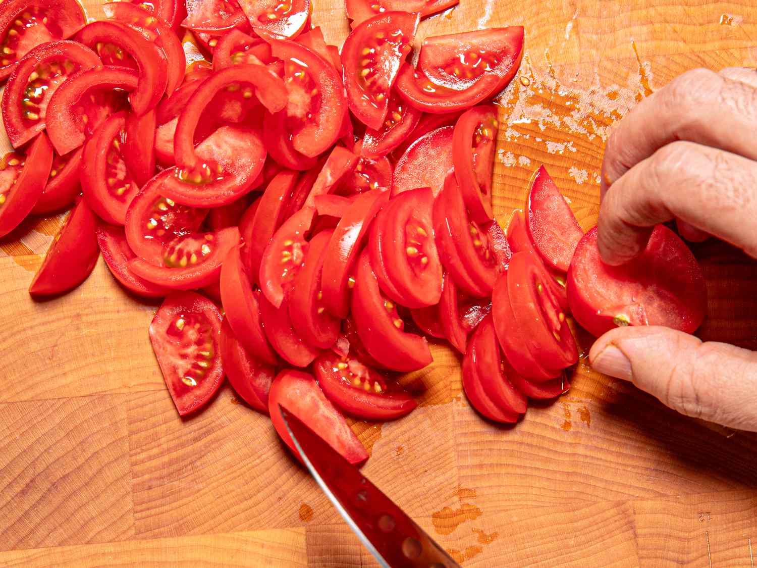 Overhead view of sliced tomatoes