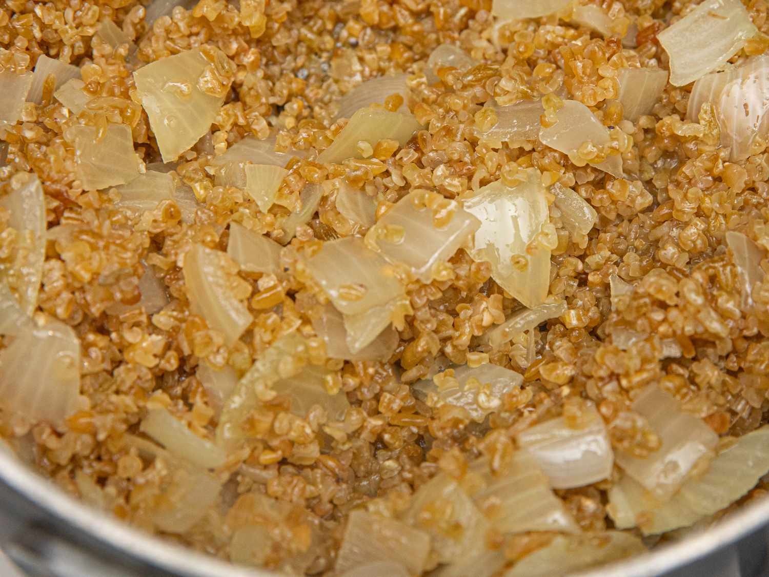 Overhead view of onions and freekeh