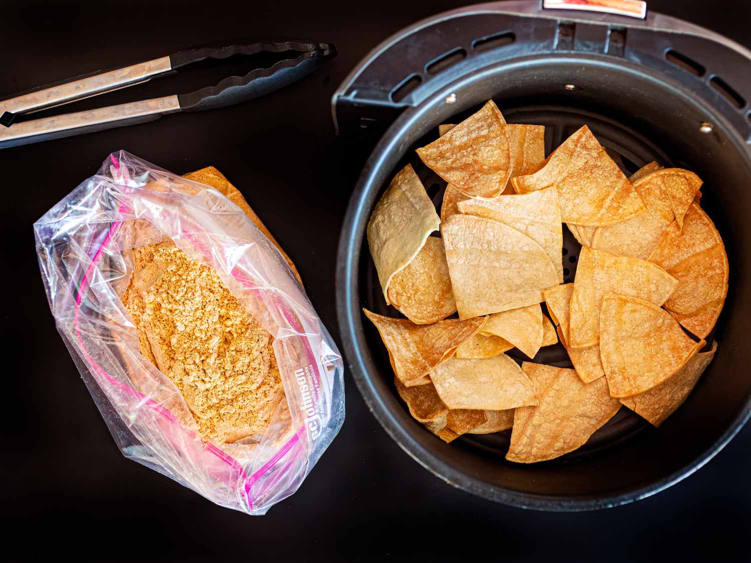 Overhead view of chips in air fryer