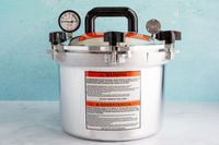 All American 15.5 Quart Pressure Canner sitting on a counter