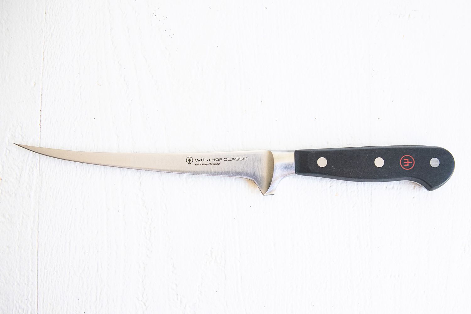 Wüsthof Classic Fish Fillet Knife on a white surface