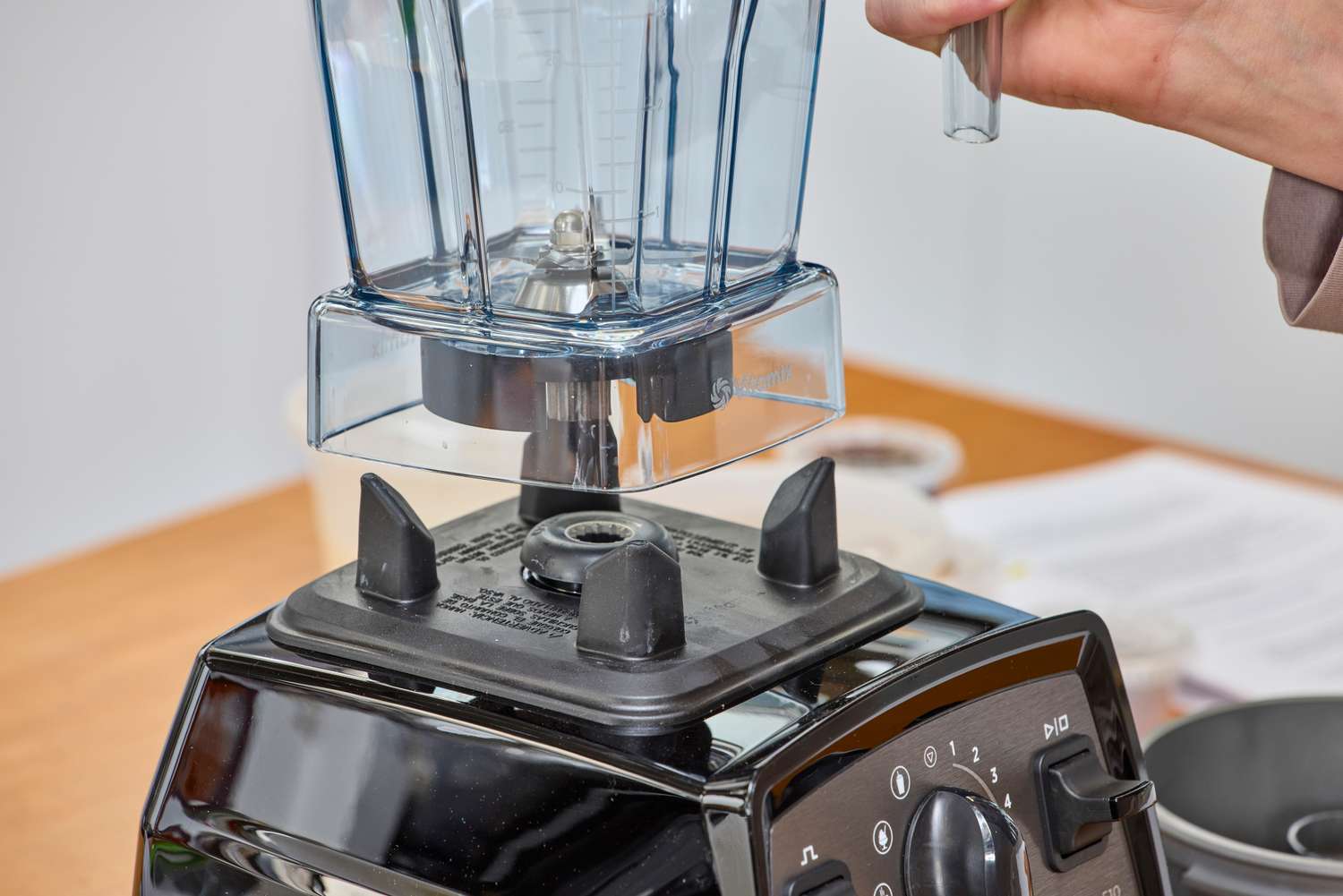 A close-up of the Vitamix Propel 510 jar hovering over the base