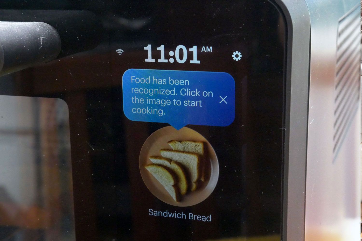 a closeup of the digital screen on the anova oven showing recognition of the bread inside