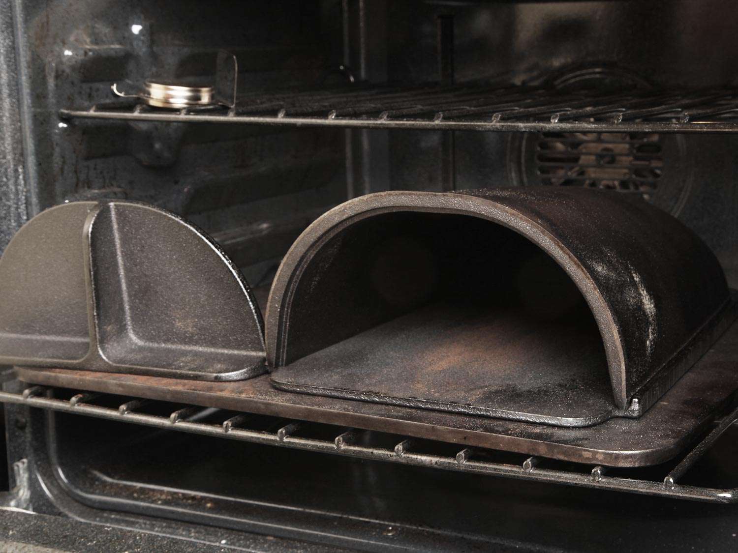 A Forneau bread oven in an oven on a baking steel. 