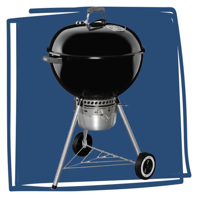 A kettlestyle charcoal grill on wheels with a deep bowl design and a lid featuring a vent
