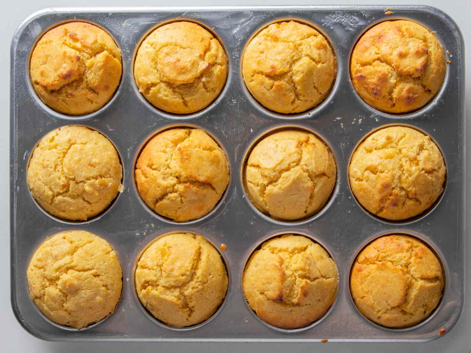 Baked cornbread muffins in muffin tin