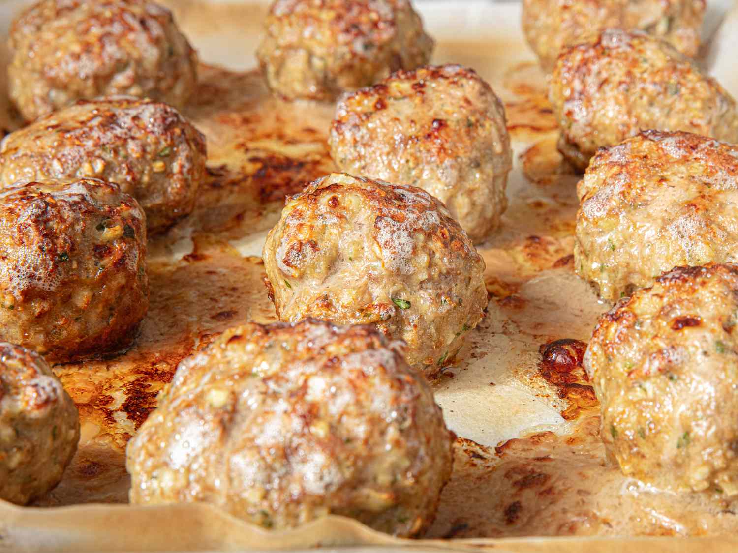 Side view of broiled meatballs