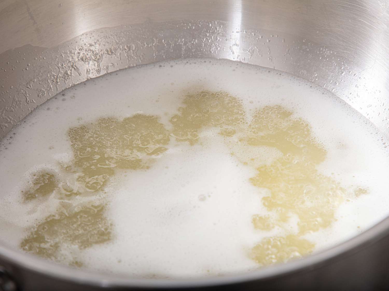 Overhead view of butter boiling