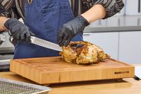 Chicken is cut with the Wüsthof Classic Carving Set