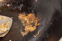 Residue left after cooking in the Yosukata Carbon Steel Wok Pan