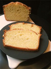 Slices of EVO and yogurt cake, served on a black plate.