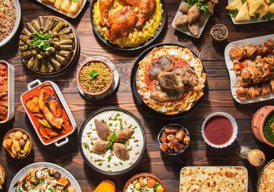 Overhead view of a table full of traditional Ramadan foods.