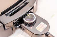 A closeup on the temperature knob of the Zojirushi electric griddle