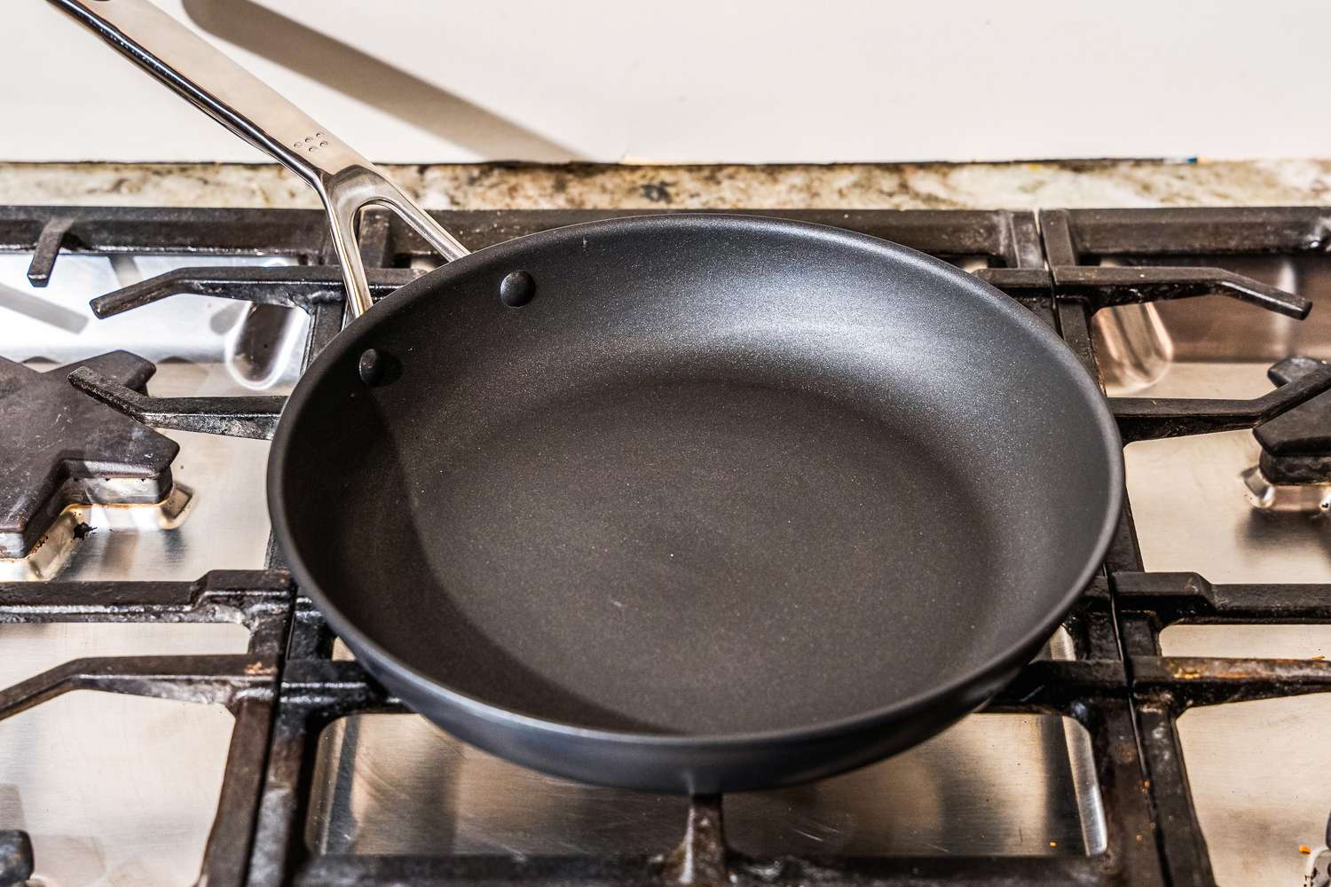 The Misen Nonstick Pan on a stovetop.