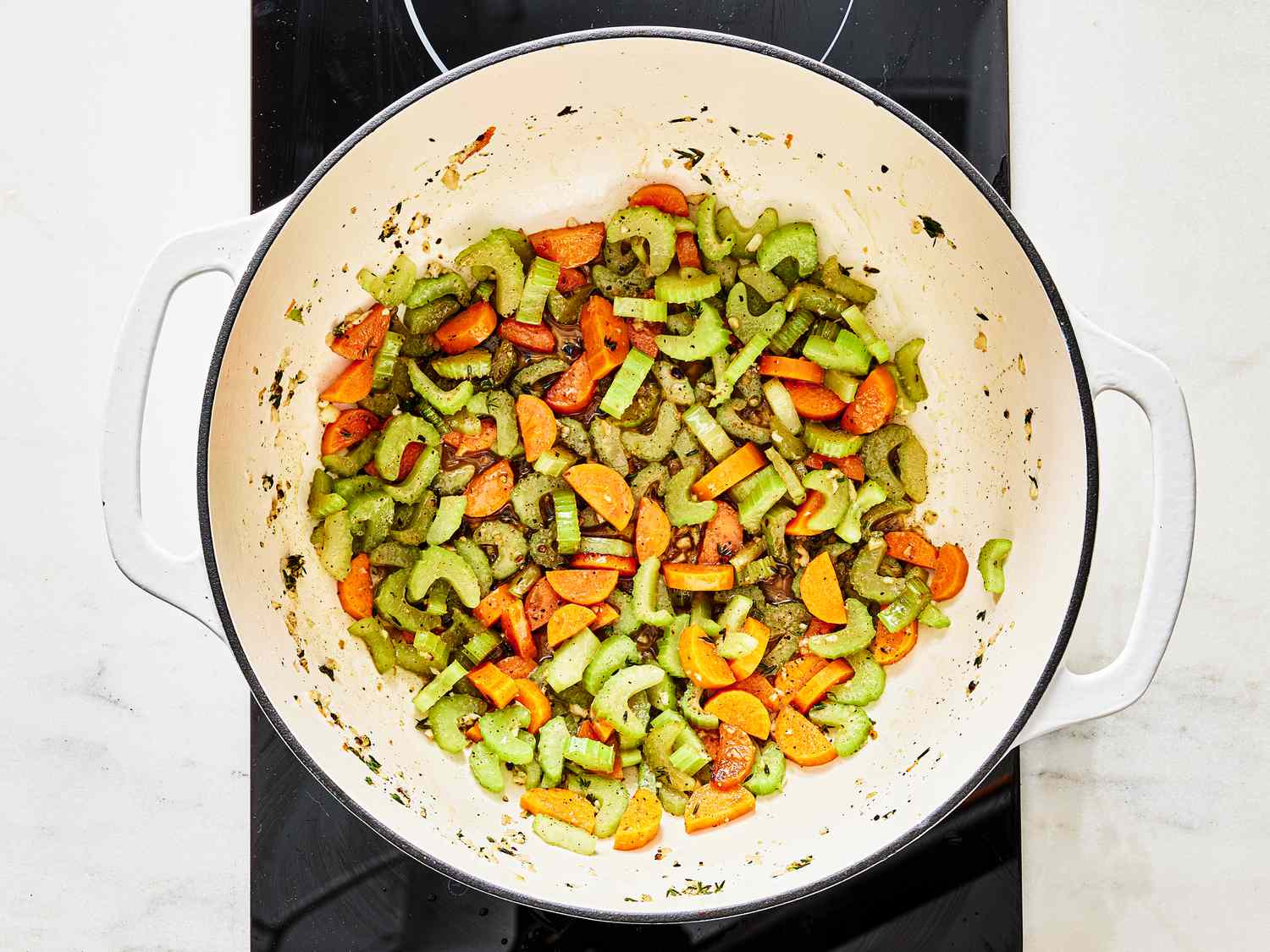 Vegetables cooking in a large pot 