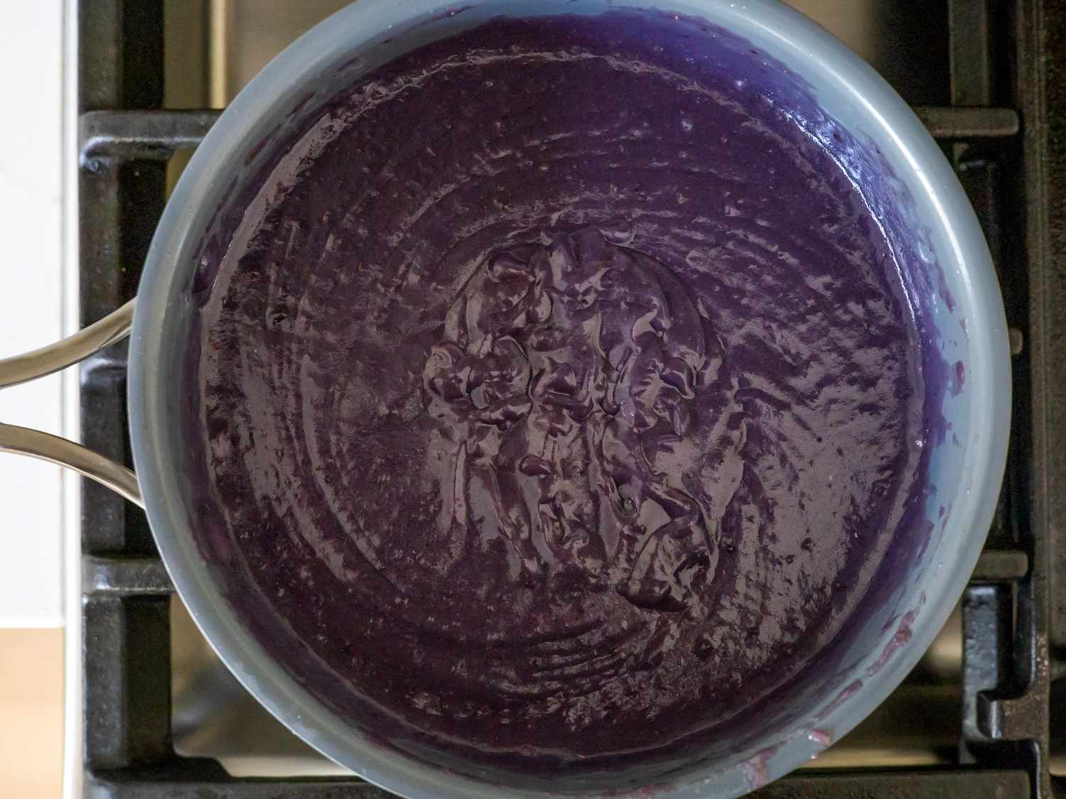 cooking ube ice cream mixture