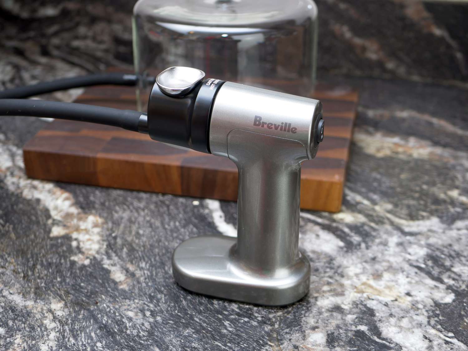 breville smoking gun with a cloche in the background