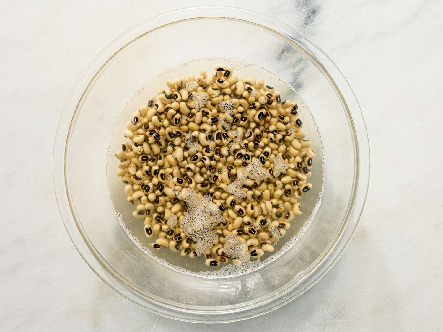Blackeyed peas soaking in a bowl of water