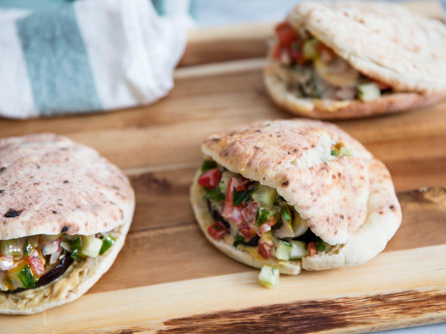 Three stuffed sabich sandwiches.
