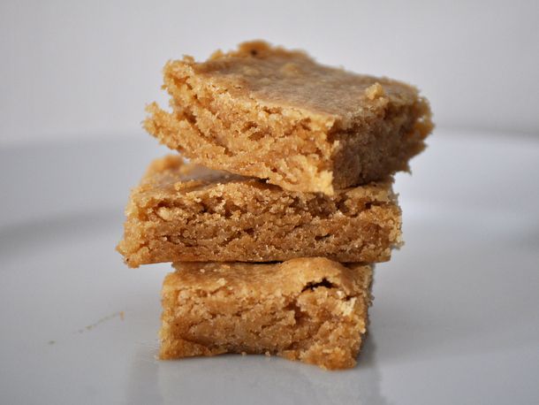 A stack of three brown butter blondies.