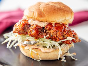 Side view of kimchi fried chicken Sandwich 