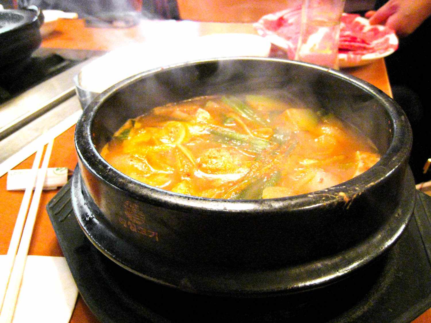 Steaming clay pot of daenjang jjigae