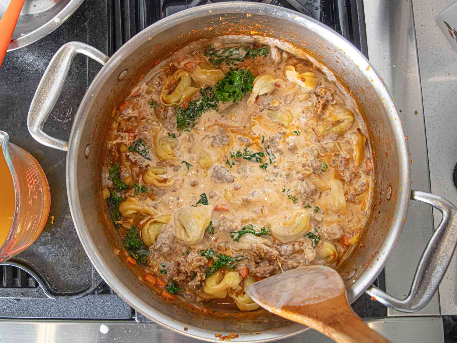 Overhead view of soup with cream added