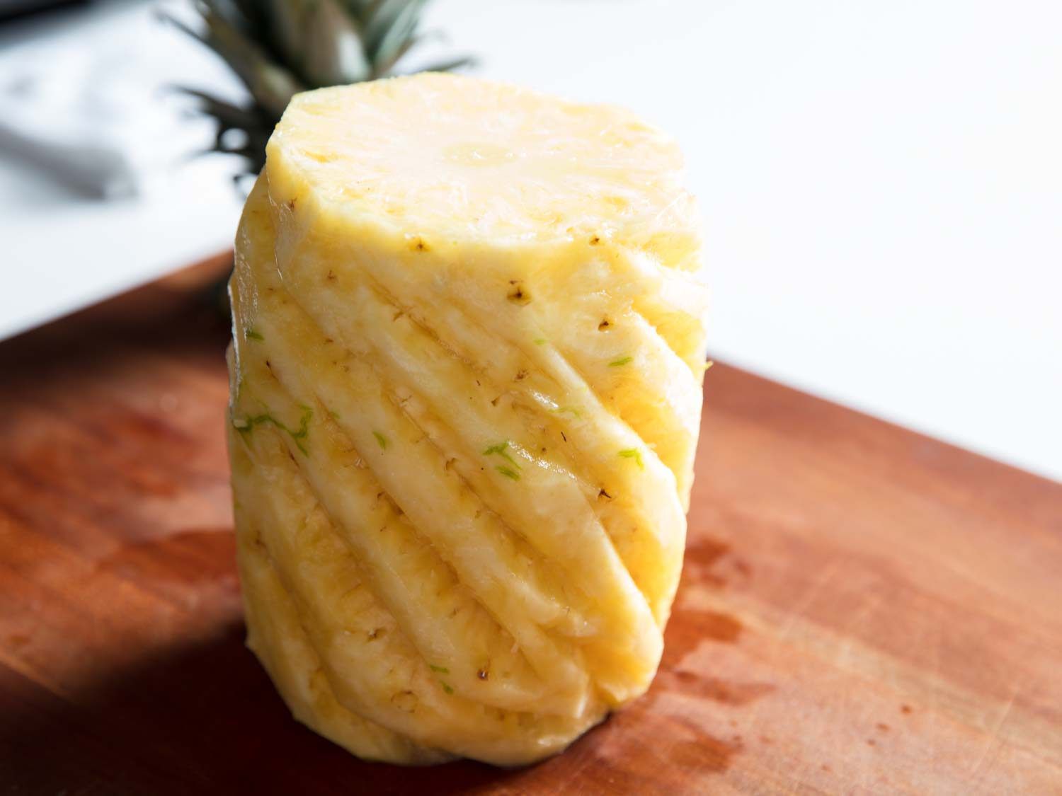 A pineapple with the eyes trimmed off.