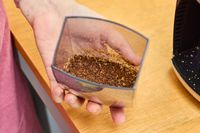 Coffee beans ground in the Baratza Virtuoso+ Conical Burr Coffee Grinder