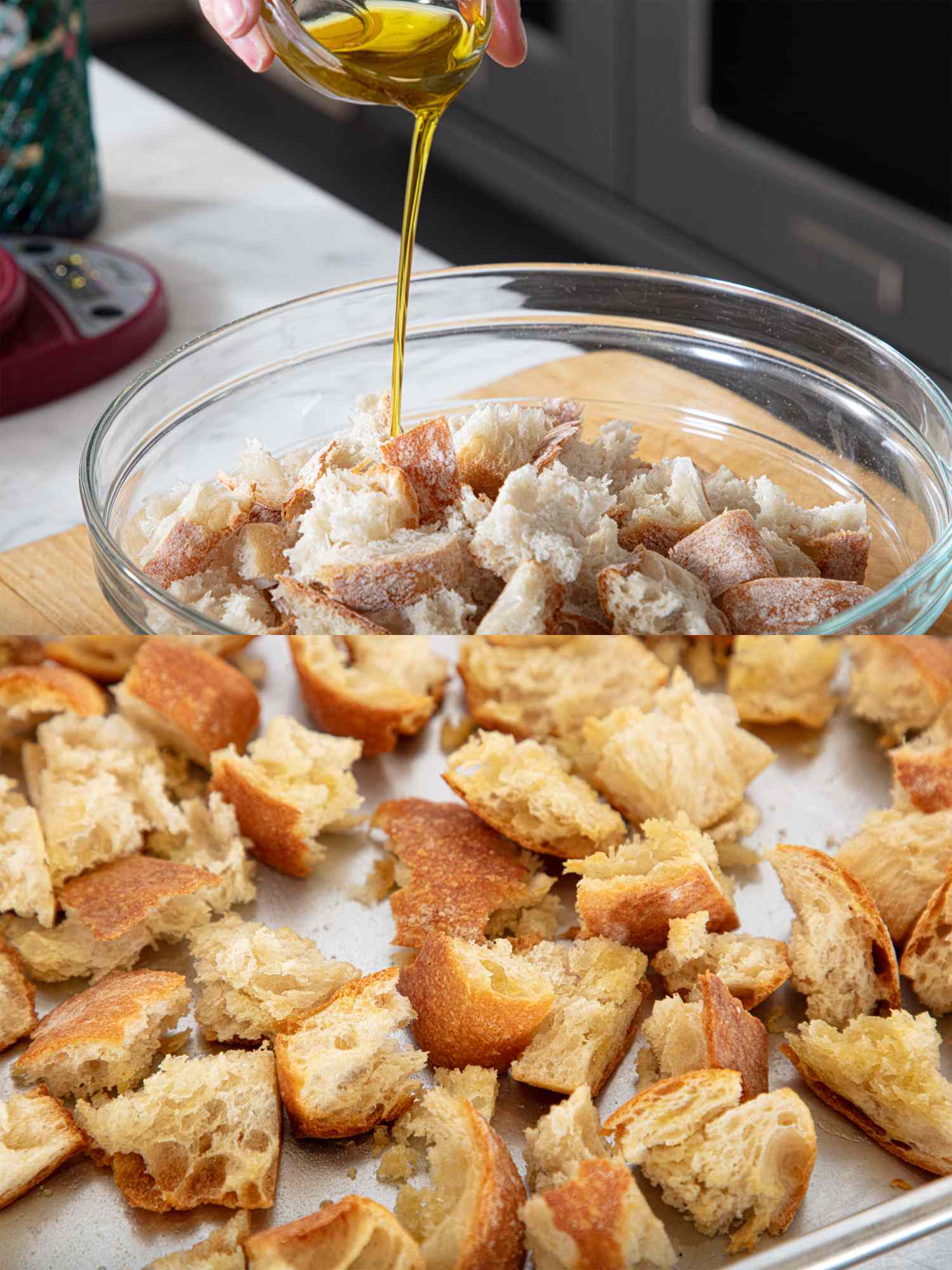Pieces of bread in a glass mixing bowl being drizzled with olive oil with toasted bread chunks on a baking sheet below