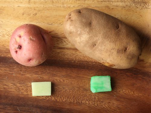comparing color absorption between cube of waxy red potato and russet potato