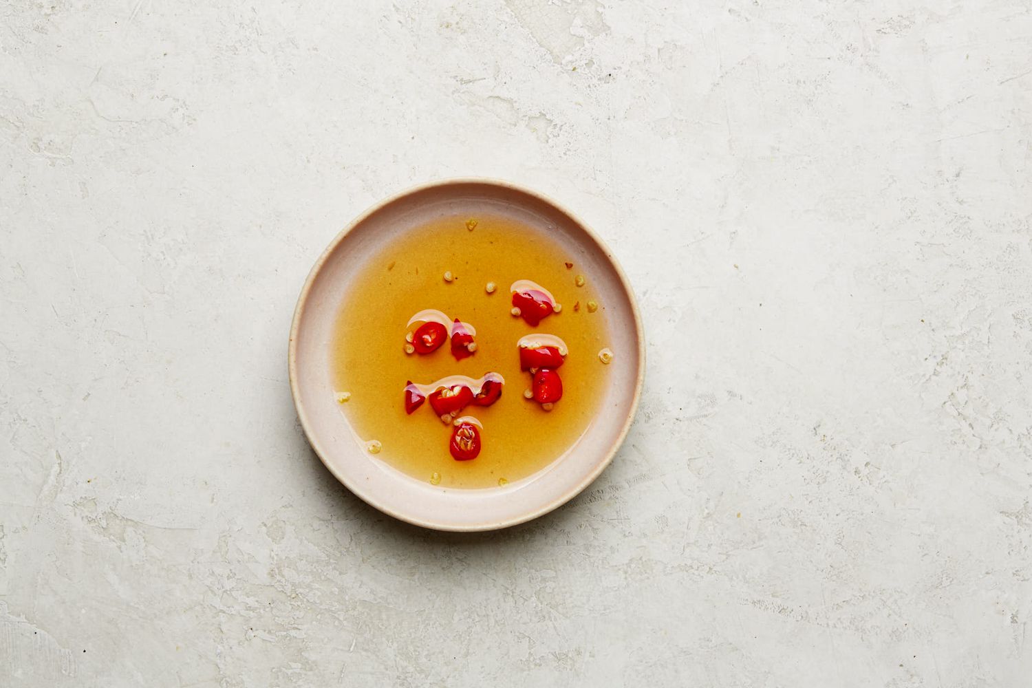 Dipping sauce in a shallow bowl